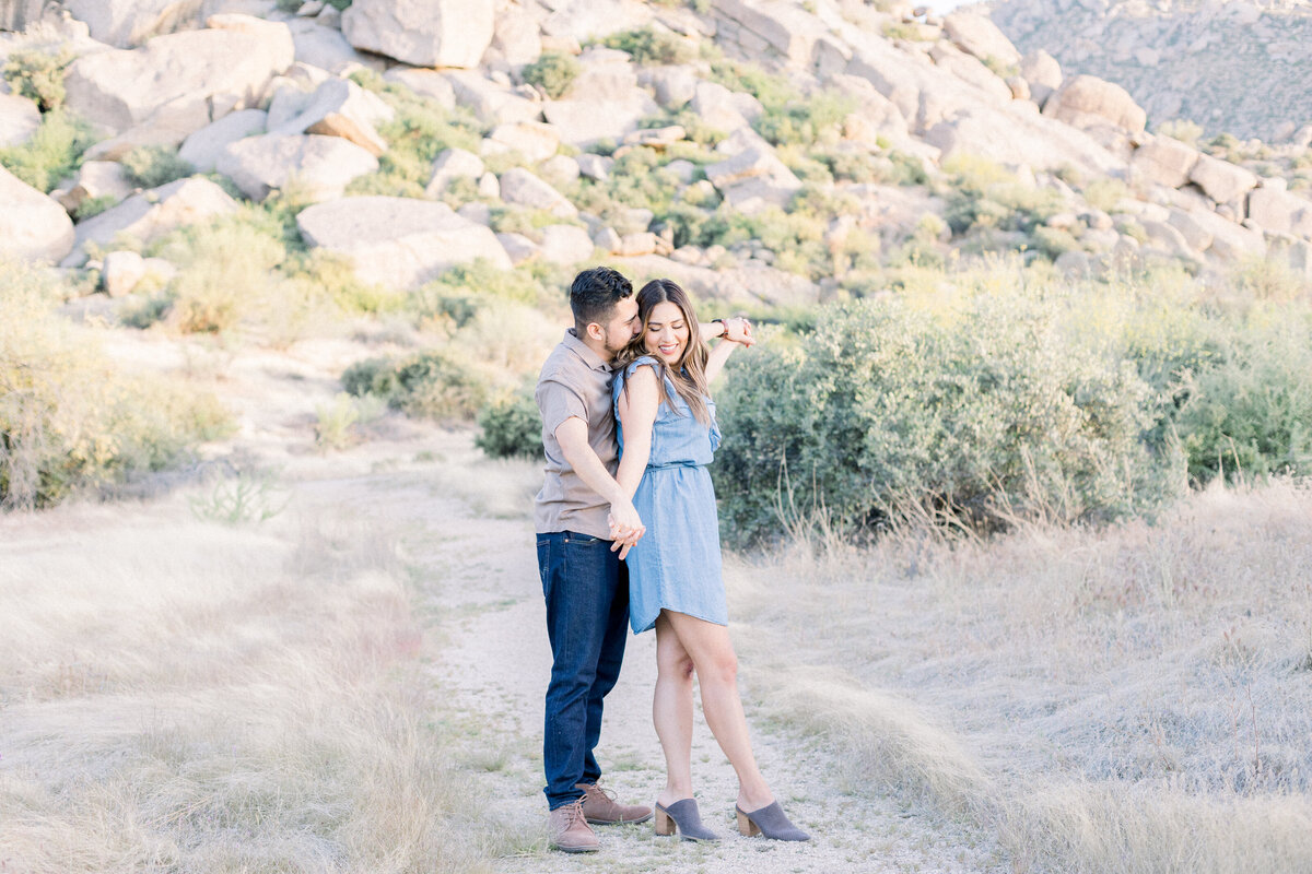 engaged couple in the desert