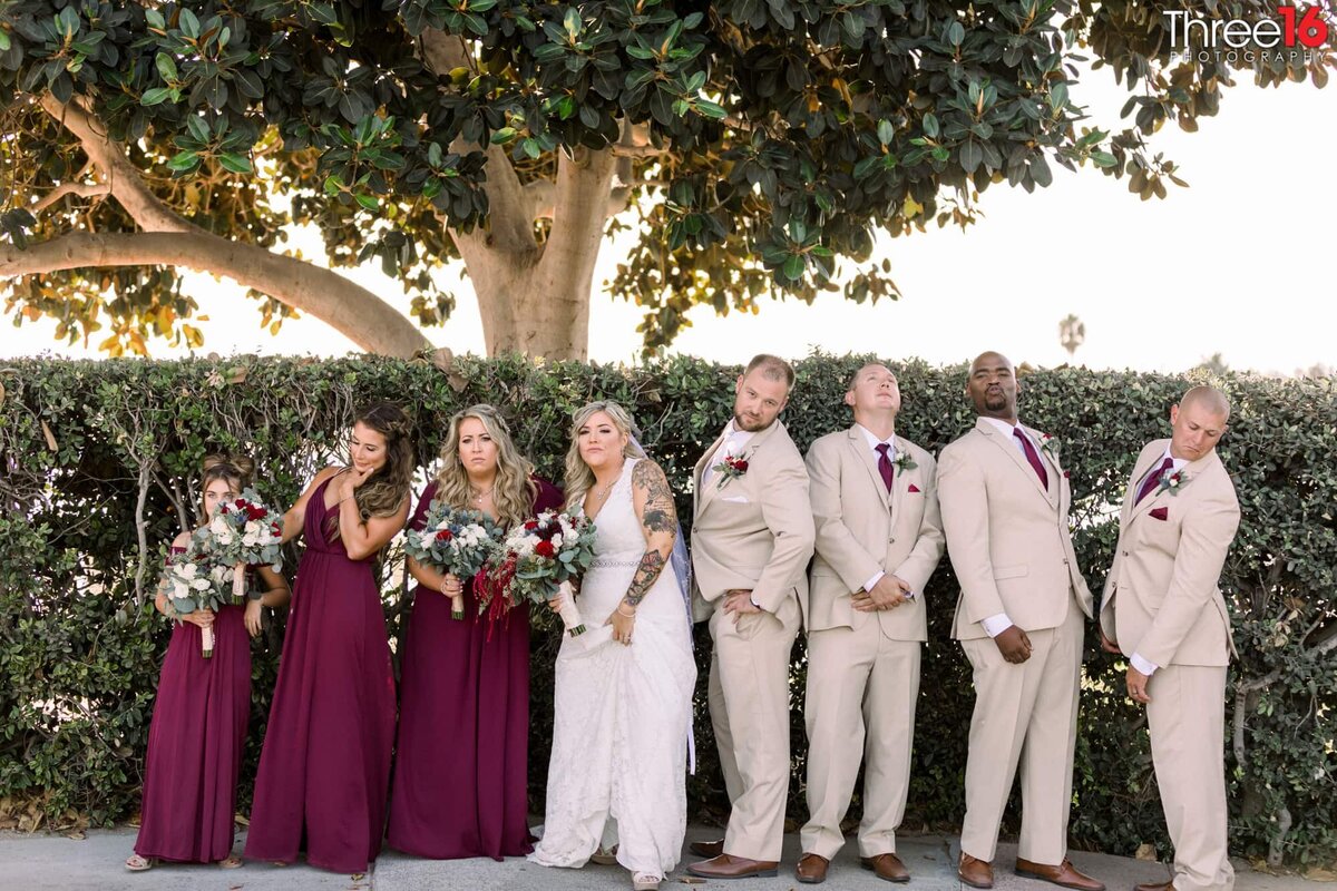 Entire Bridal Party goofs off during photo session