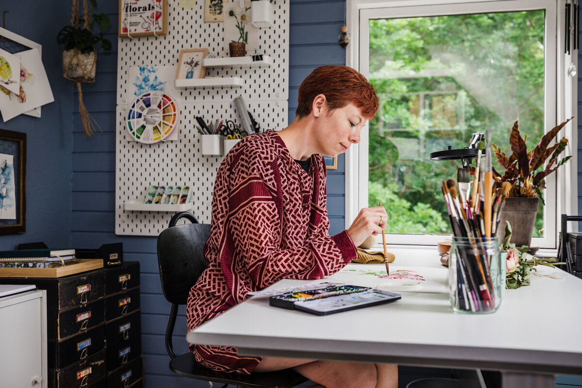 Camilla Dambo Brix painting in studio