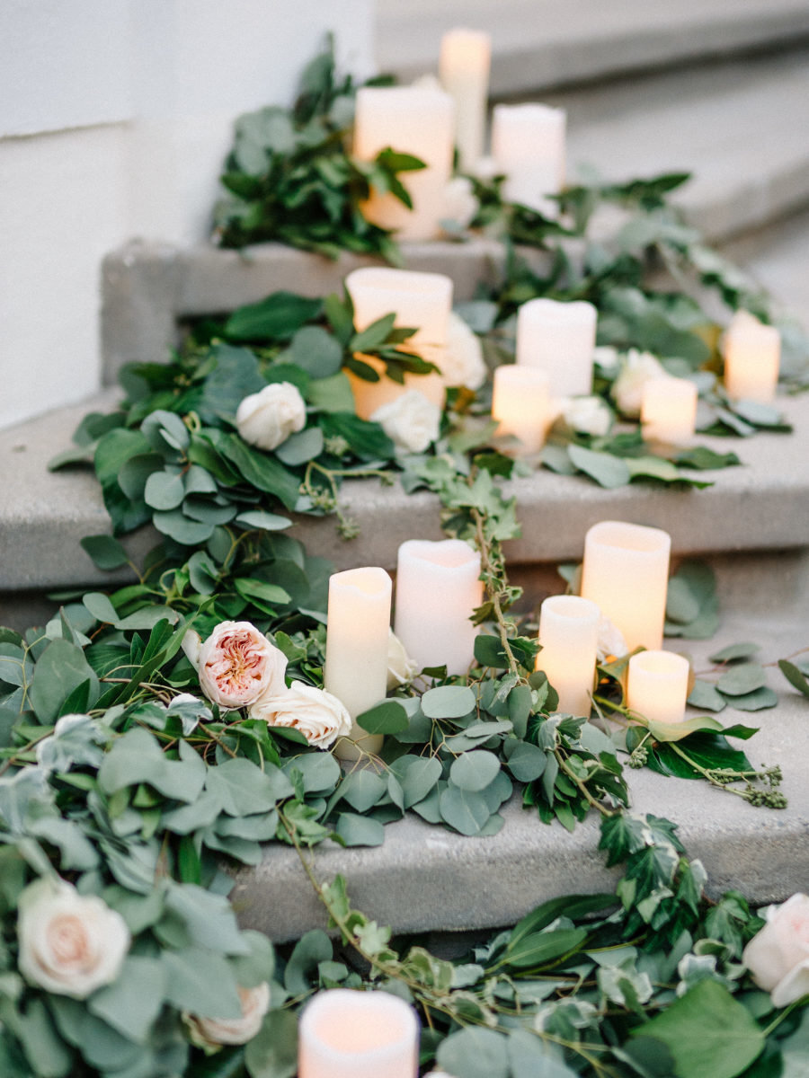 greenery, loose blooms and candles on staircase steps