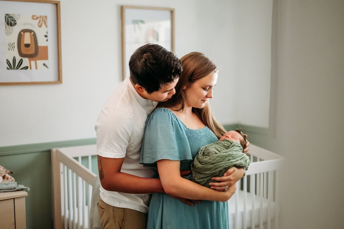 mom-dad-baby-nursery