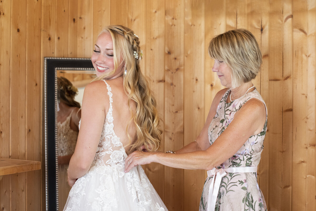 Bride getting ready with mother