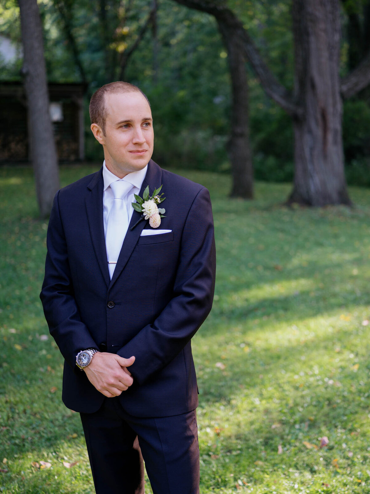 Groom in black tux.