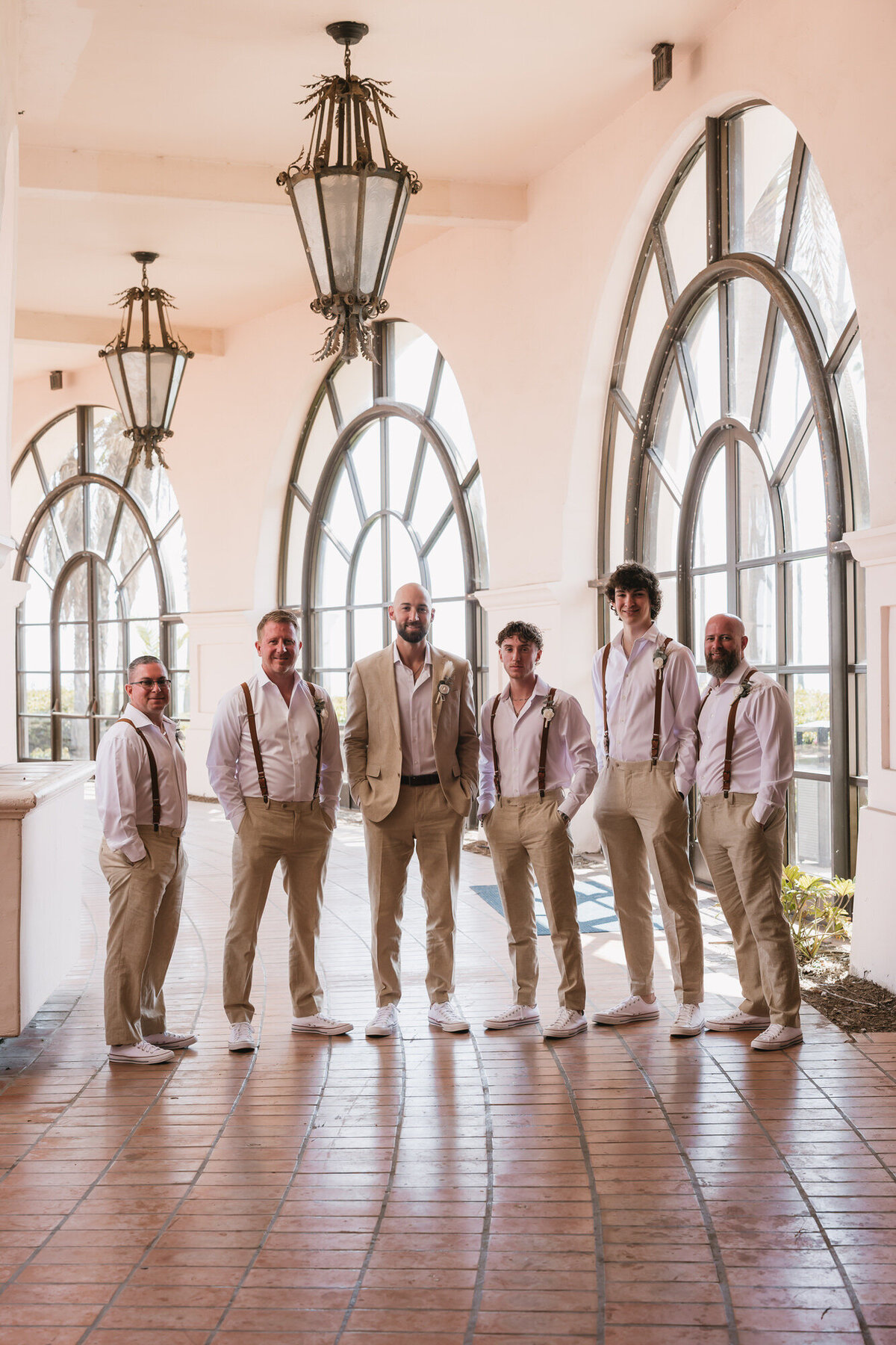 Groom and groomsmen posing for portrait at Hilton Beachfront Resort Santa Barbara