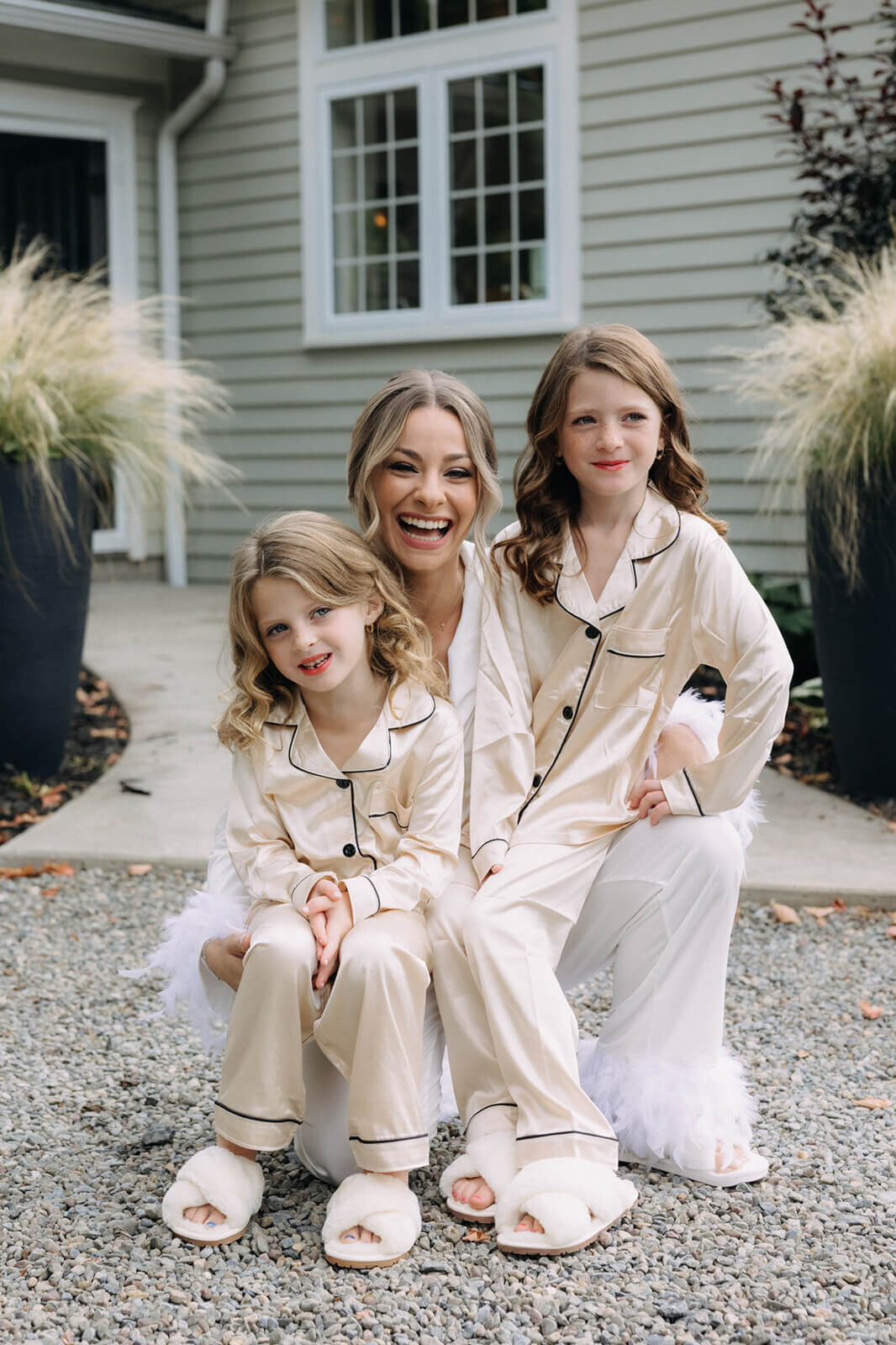 Bride wearing matching pj's with young girls