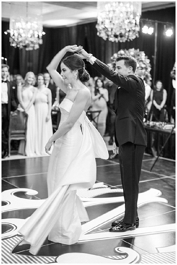 Black and White Photo of Bride and Groom Dancing on Custom Dancefloor © Bonnie Sen Photography