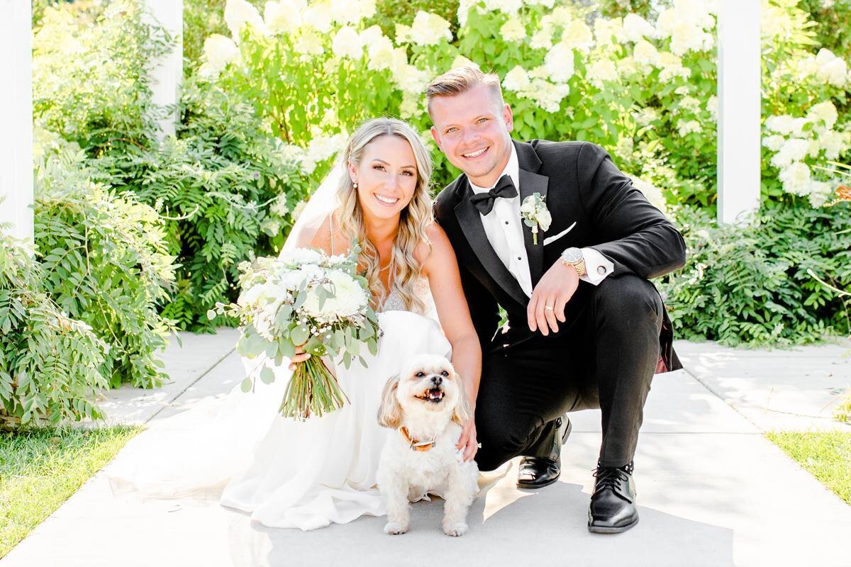 cute photo of bride and groom with their dog