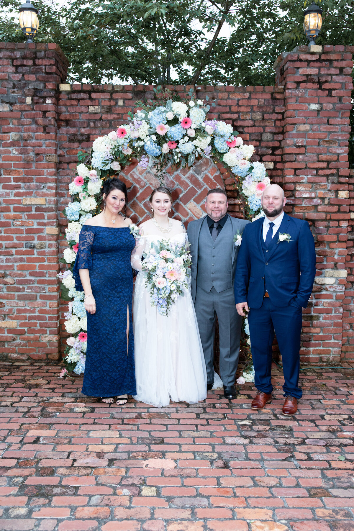 Atlanta-Wedding-Photographer-Carl-House-Family-Portrait-Under-Floral-Arch