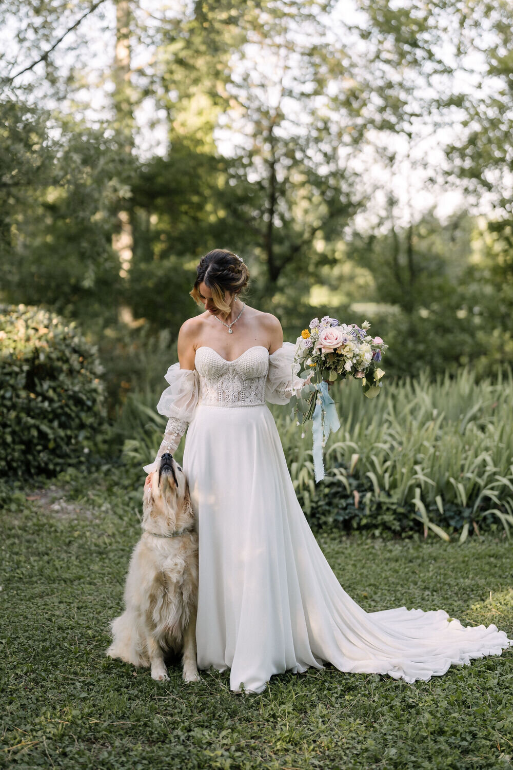 bride-with-dog-in-the-french-garden