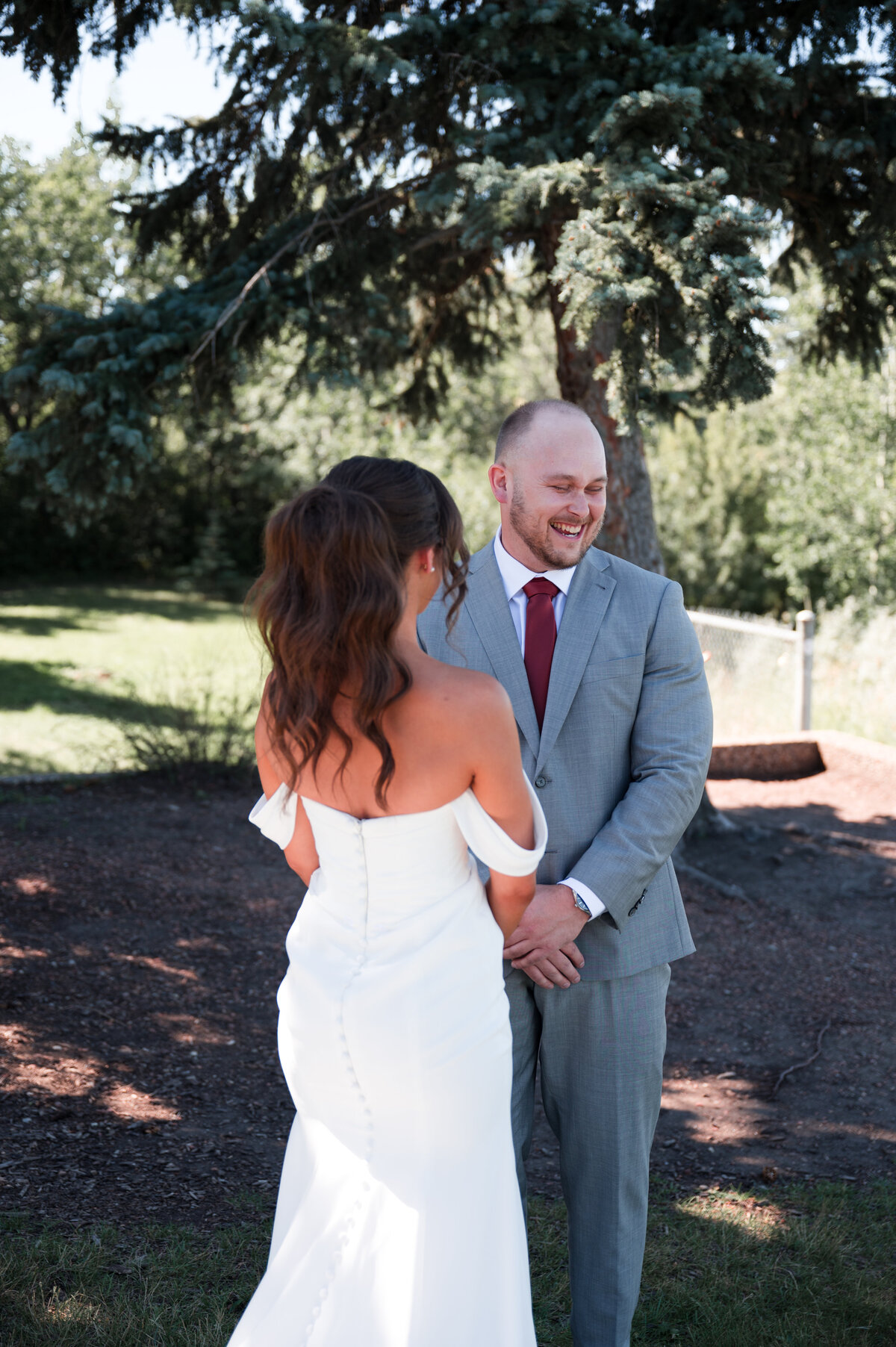 emotional groom sees his bride for the first time