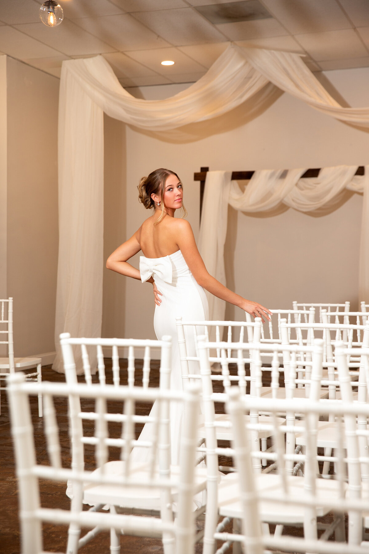 Bride portrait in ceremony space at The Venue 107.