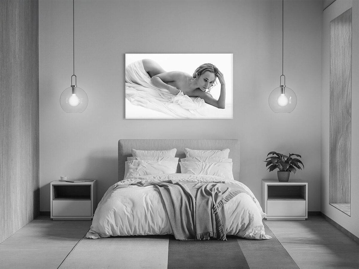 Large boudoir wall print above the bed