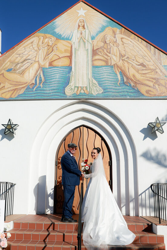 father-and-bride-entering-mary-star-of-the-sea-catholic-church