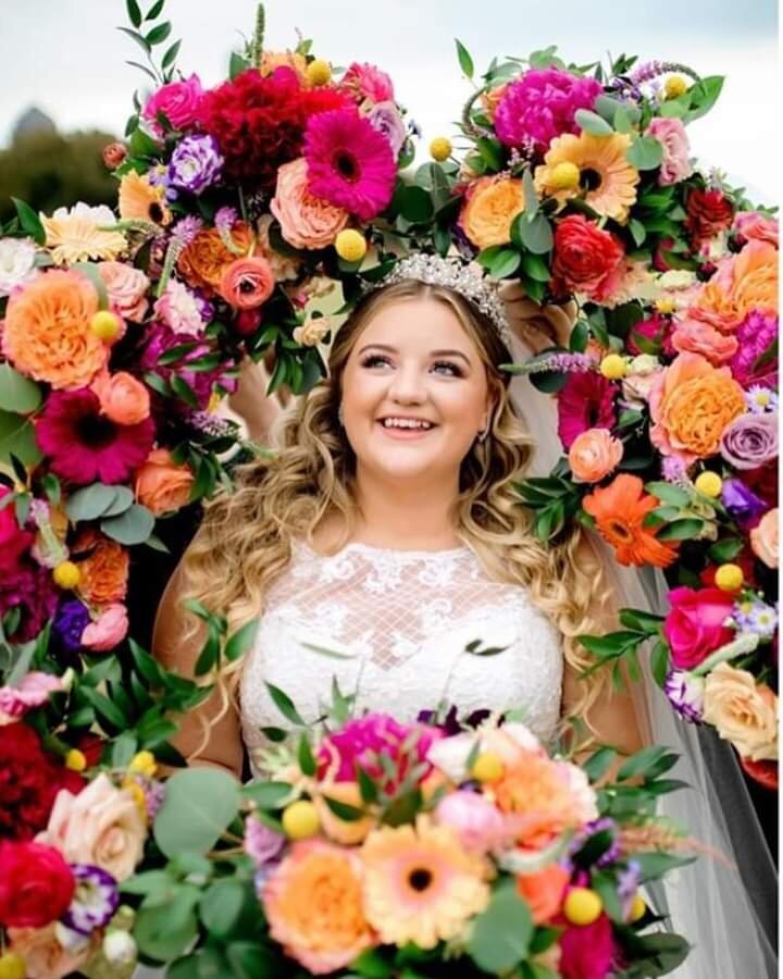 Breathtaking wedding flowers in Tulsa by Shuman Koutory. Luxury floral installations, bridal bouquets, and venue decor for Oklahoma's discerning couples.