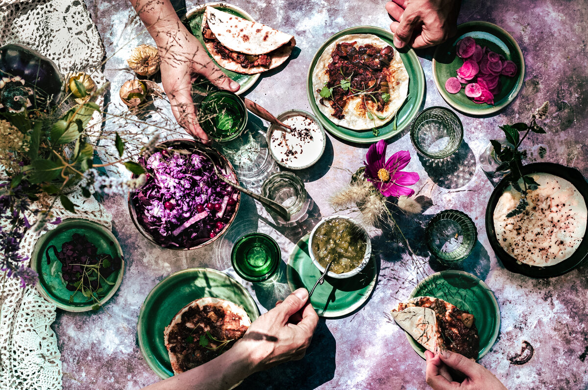 taco-feast-large-table-scene-composite-hands-in-frwme-gathering