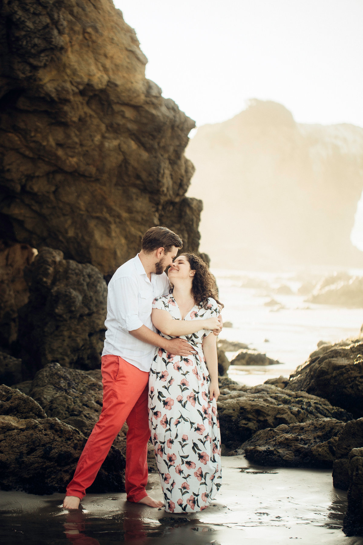 Engagement Photograph Of  Man And Woman Staring At Each Other And About To Kiss  Los Angeles