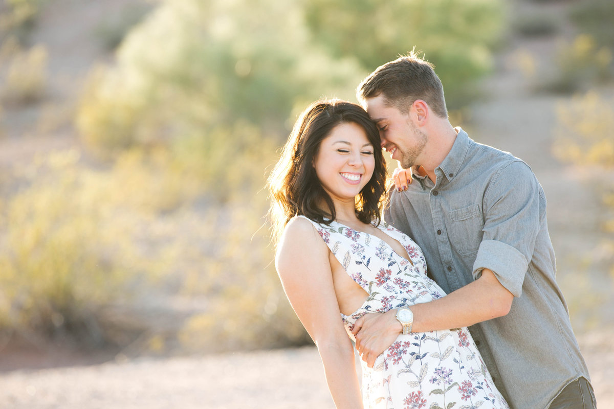 Capture the whimsy of your love with an engagement session at Papago Park in Scottsdale. This gallery features striking red rock formations, serene desert scenery, and playful moments that reflect the joy and excitement of your engagement