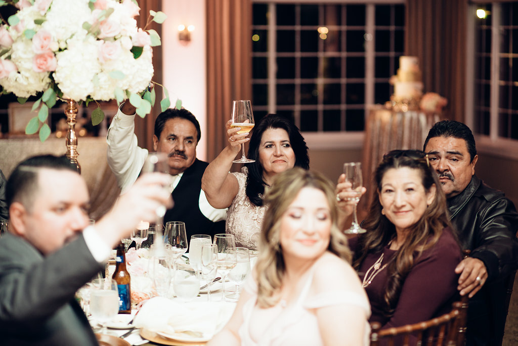Wedding Photograph Of Visitors Raising Their Wine Glasses Los Angeles