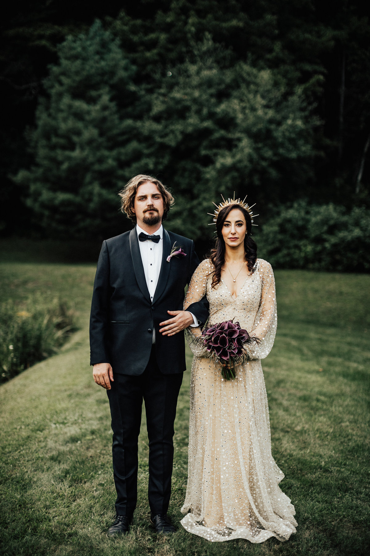 bride and groom staring at camera