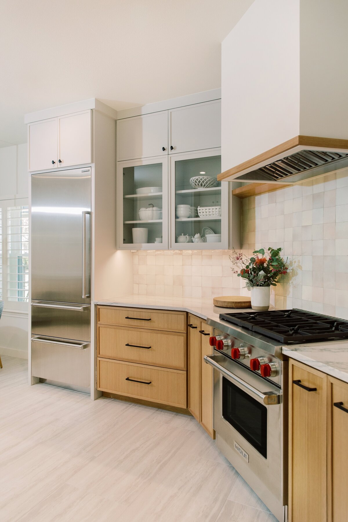 hello-home-modern-kitchen-remodel-natural-wood-cabinets-zellige-backsplash-wolf-range-austin-40