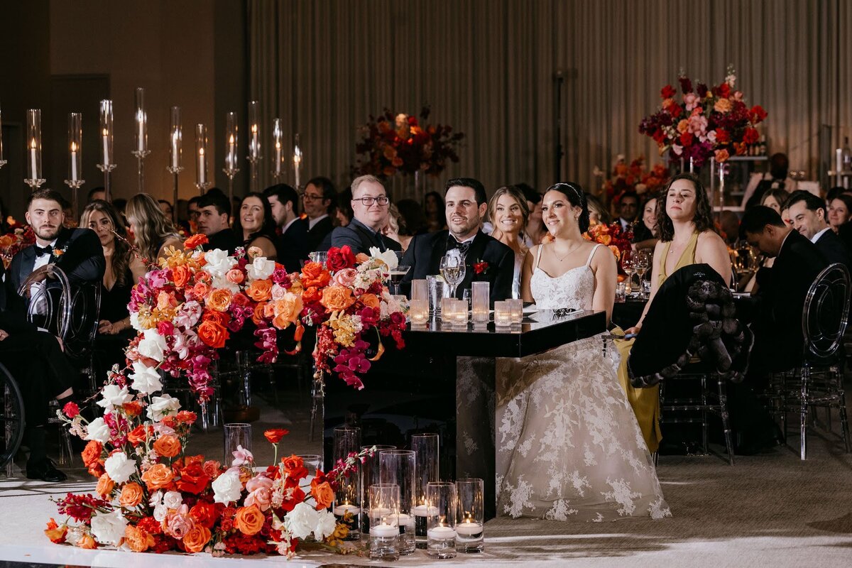 modern sweetheart table design with asymmetrical florals by Philadelphia wedding florist Sebesta Design