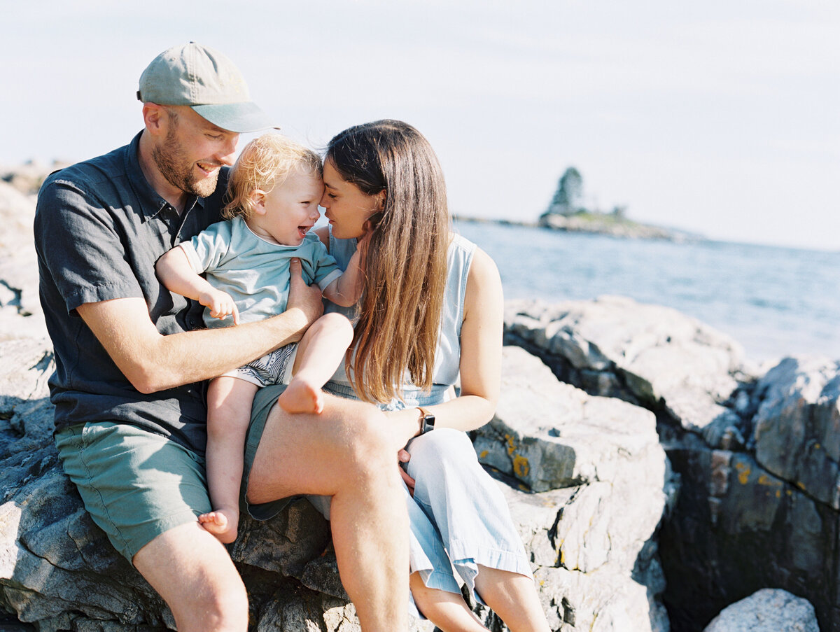 couple with baby by New Hampshire based family photographer