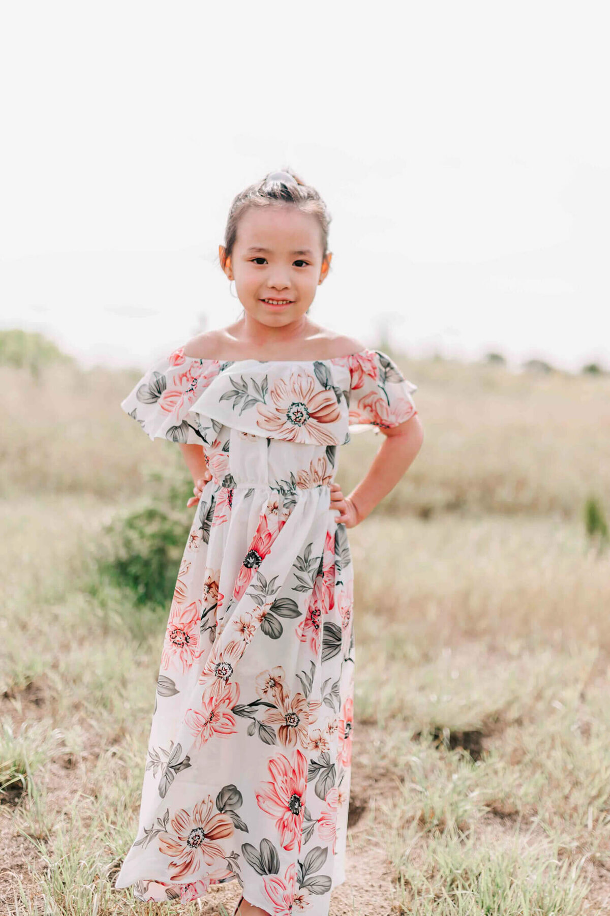 The youngest girl by herself. 