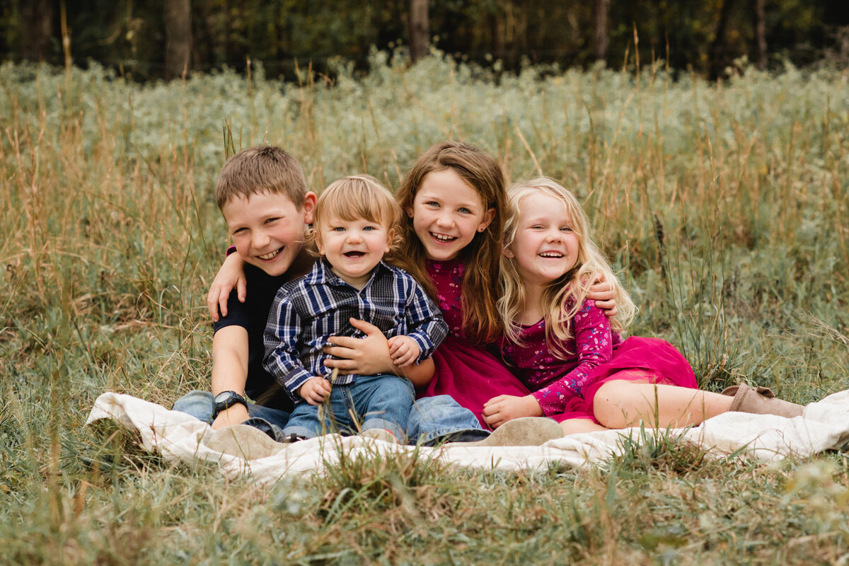 Outdoor family photography session near Sherman TX; four kids