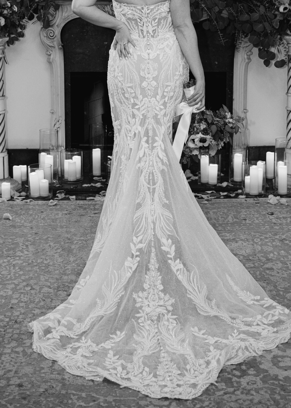 editorial black and white close up photo of bride in lace wedding gown