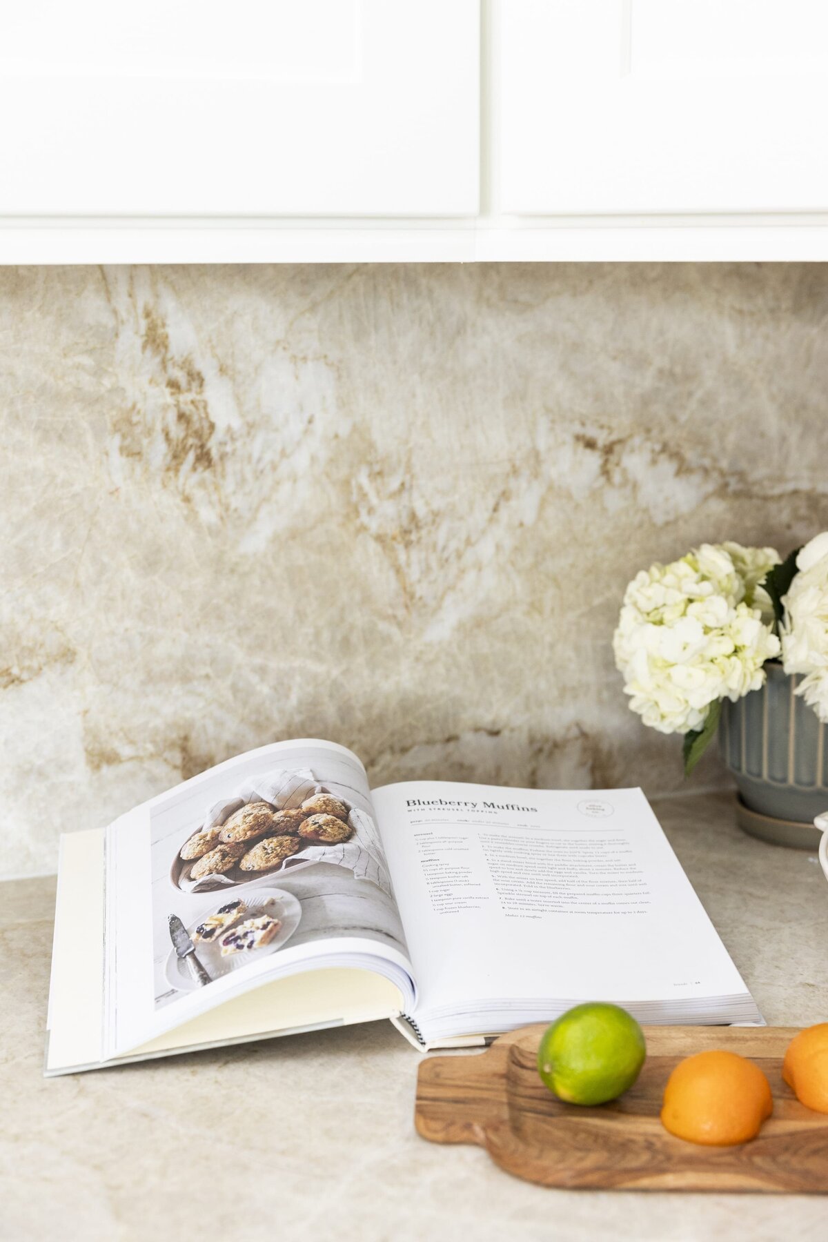 dewine design orlando interior designer windermere full home renovation kitchen cookbook and limes on cutting board