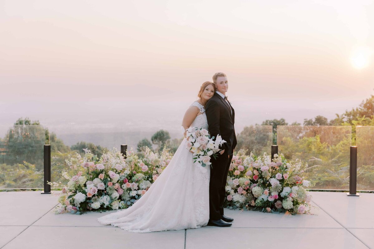 Burritt on the Mountain Wedding Photo with Pink Flowers and Sunset