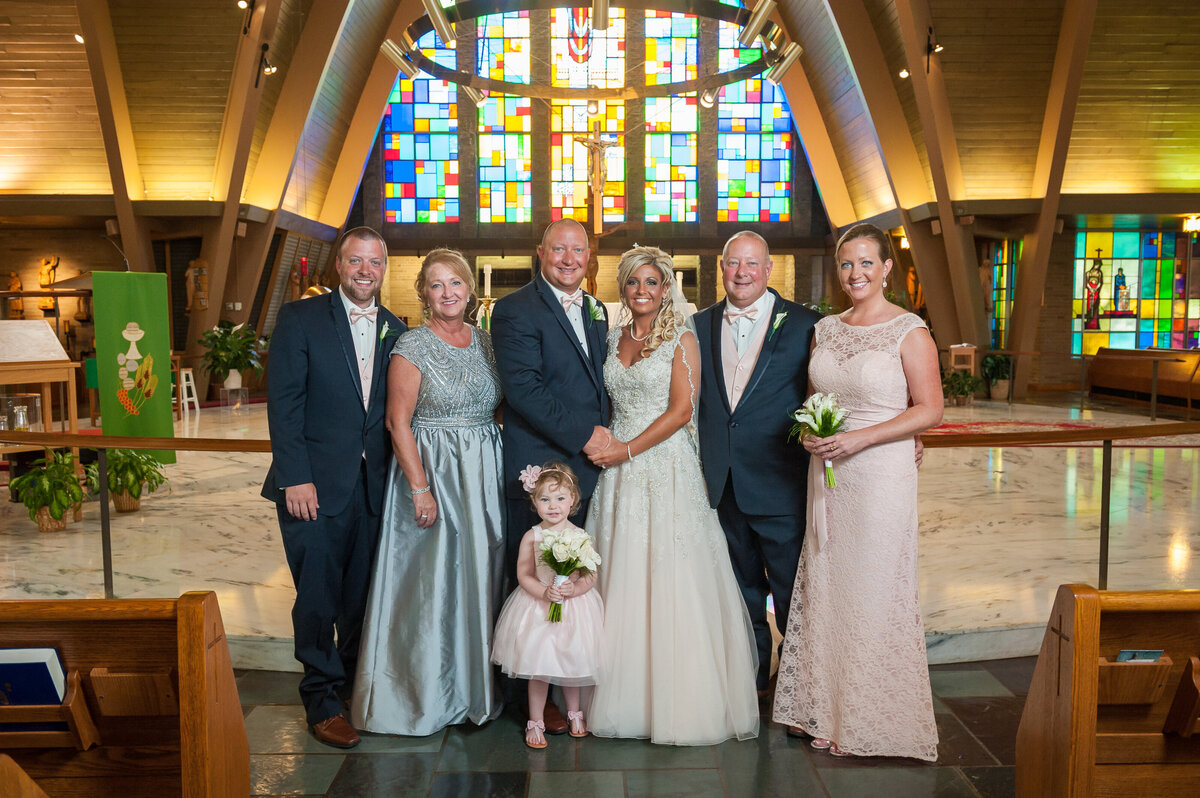 Family portrait during wedding at Saint George Erie.