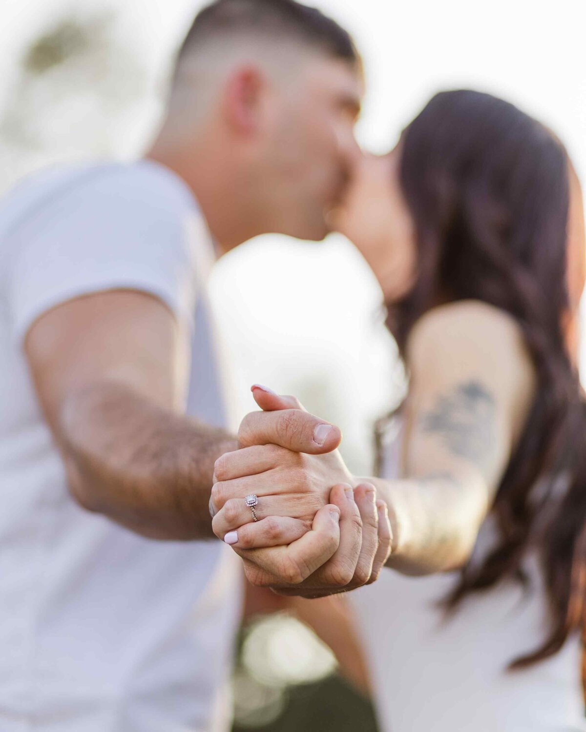9-engagement-ring-couple-kiss