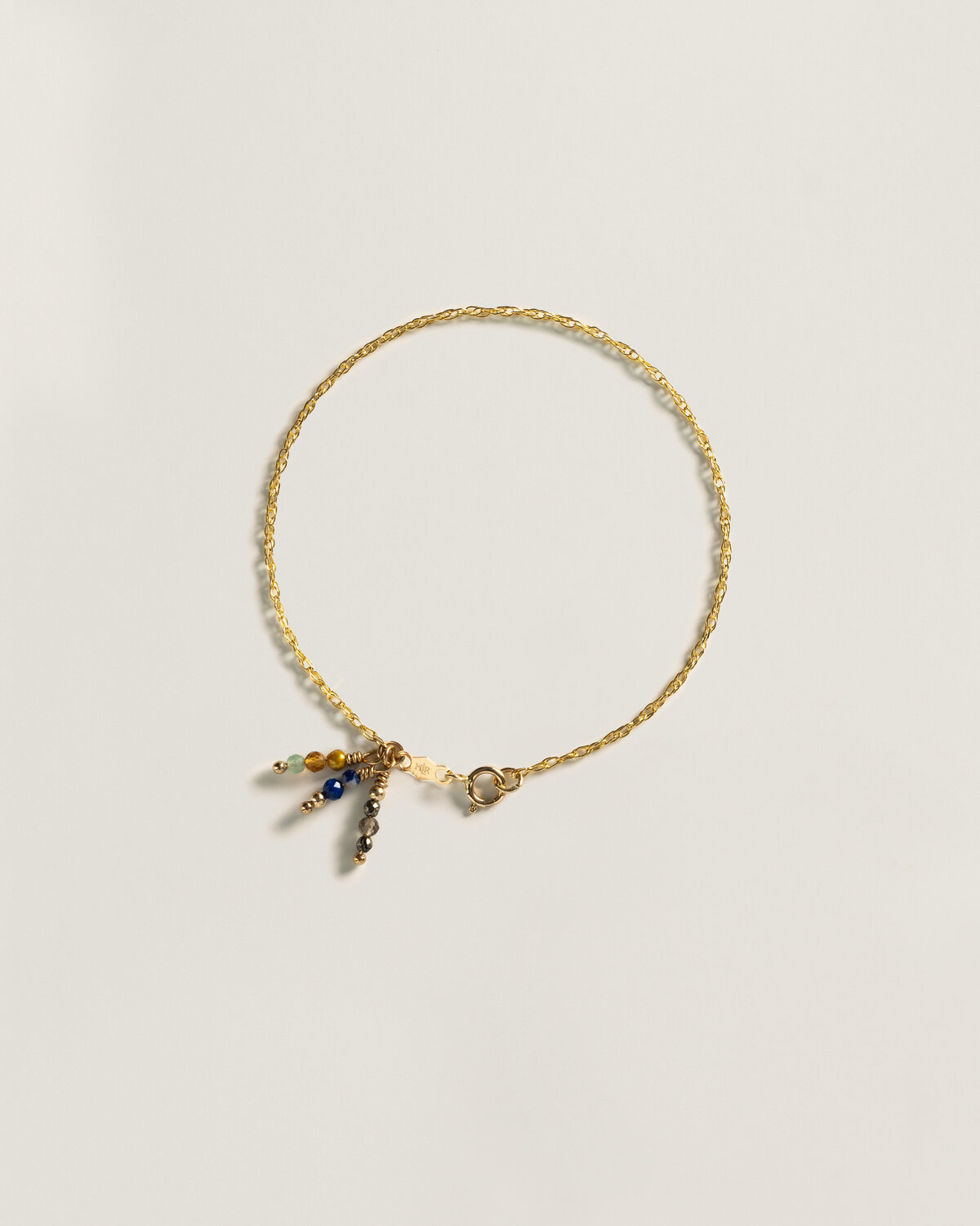 Flat lay photo of charm bracelet