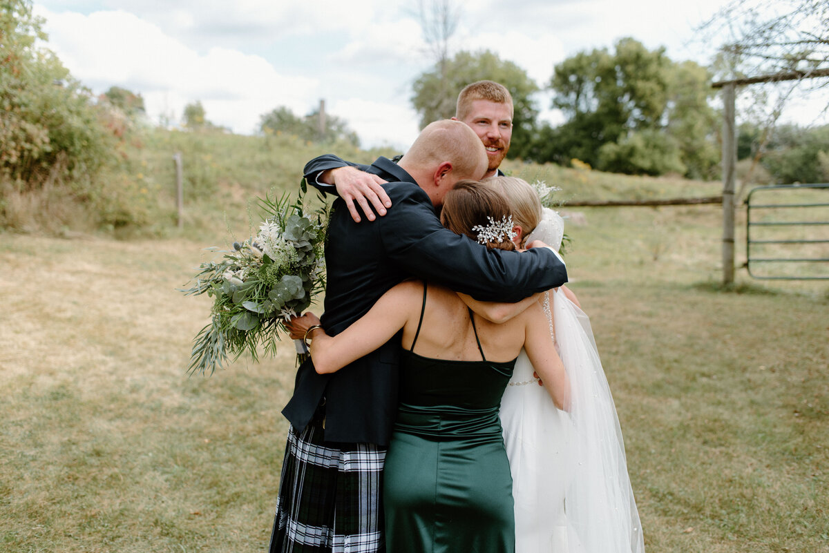 group hug with wedding party