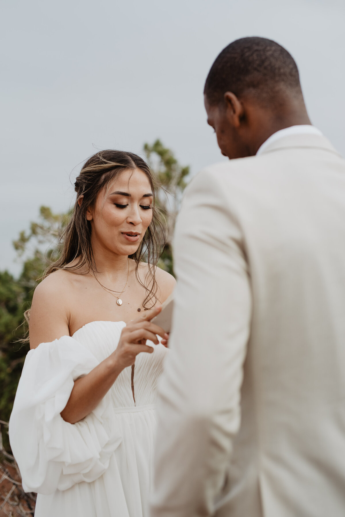 Utah Elopement Photographer captures bride reading vows