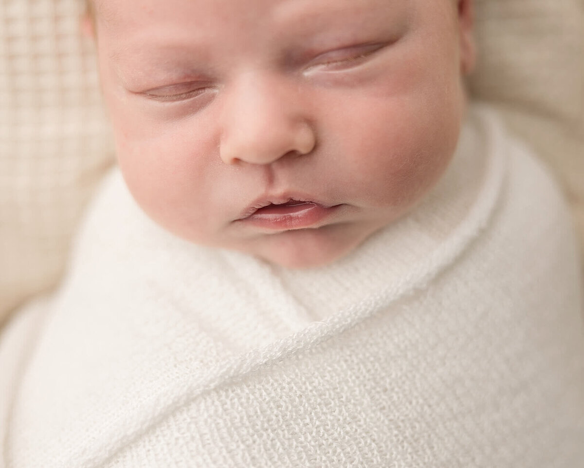 baby boy in home newborn session picture of lips
