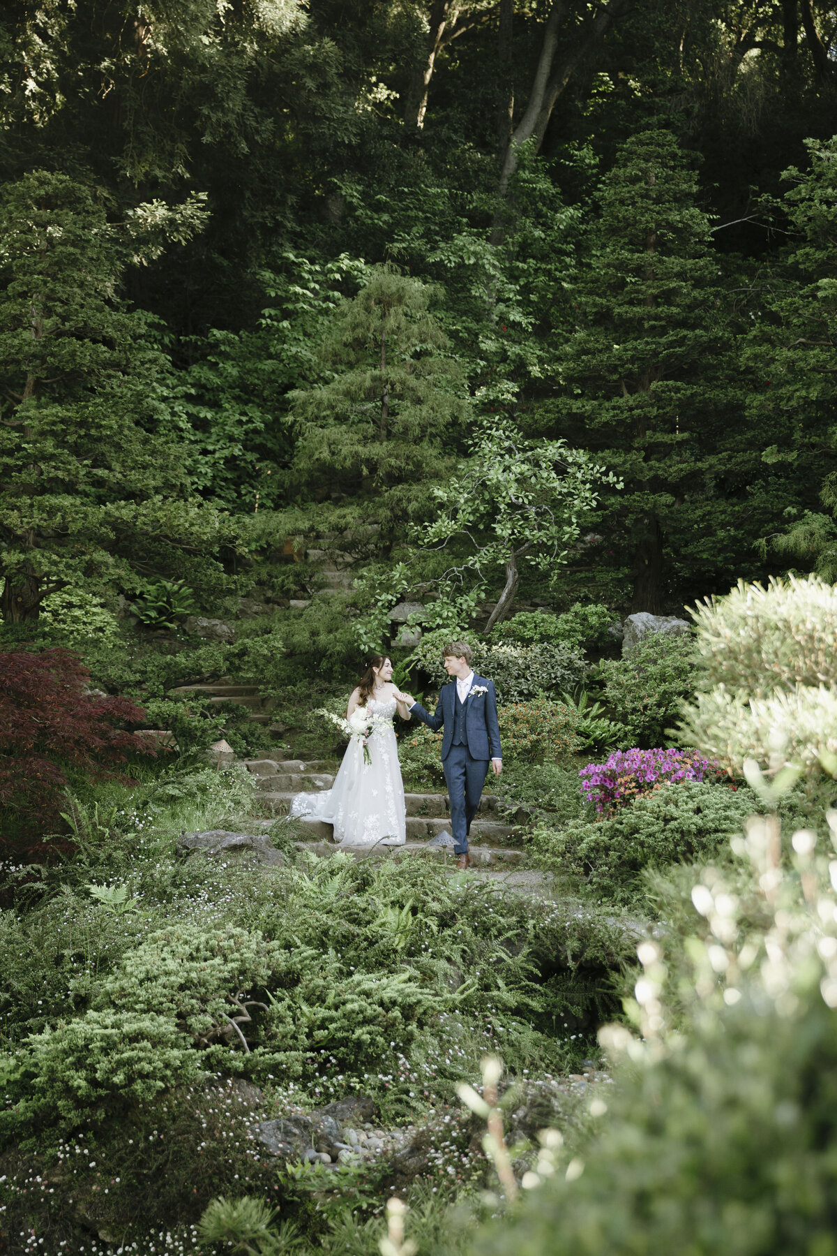Bride and Groom posing in tea garden