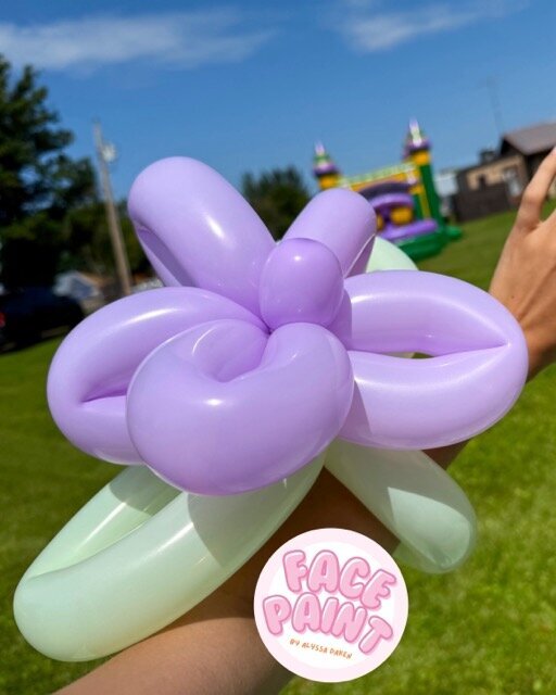 face-painting-by-alyssa-daken-balloon-animal-flower-corasage-bemidji