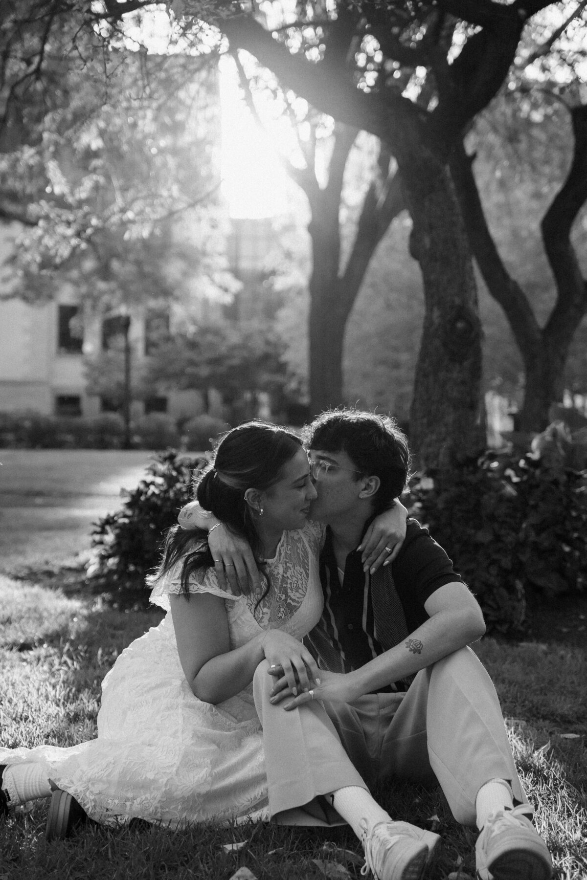 black and white overlay, happy couple sitting in a park