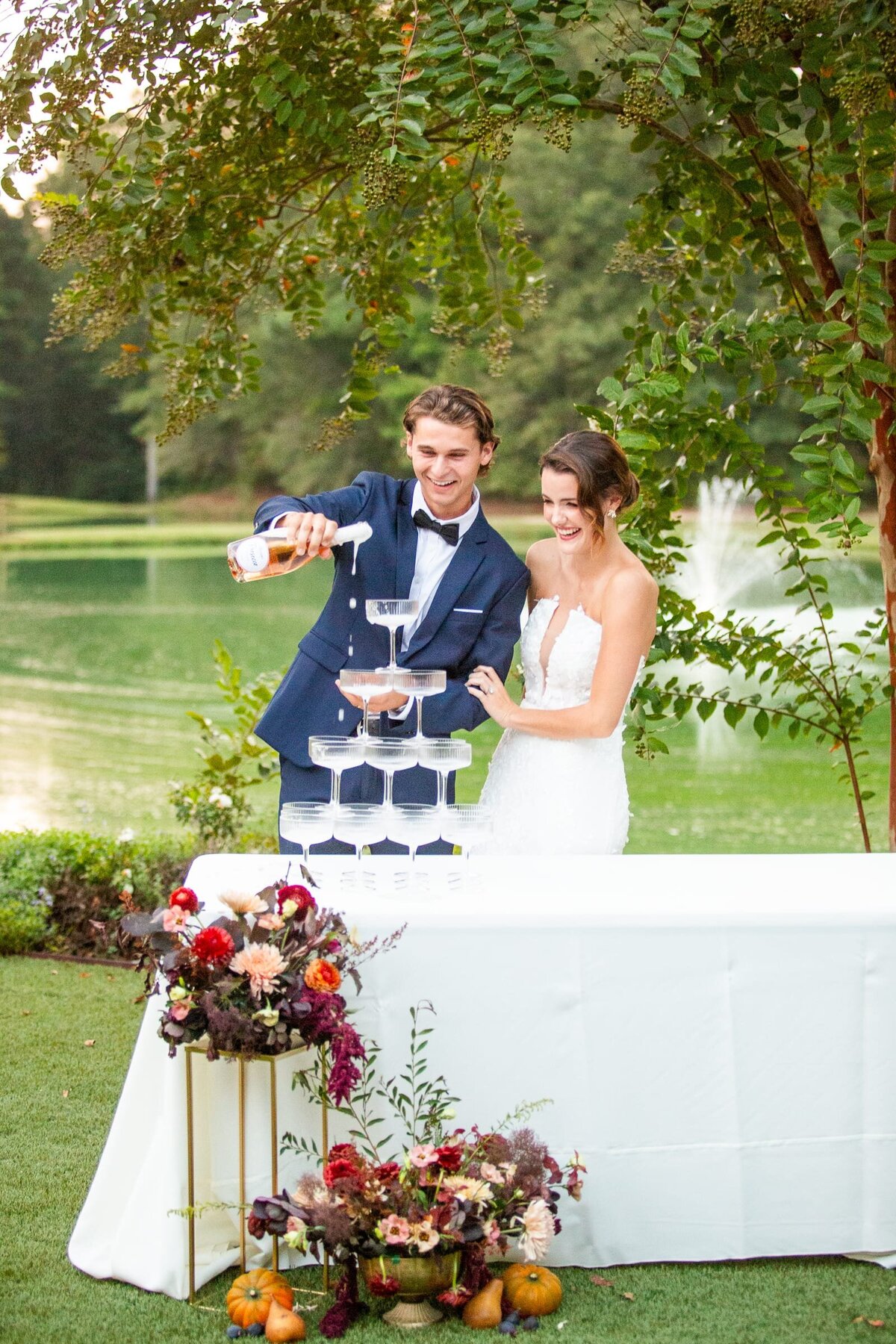 wedding-couple-pouring-champagne-tower