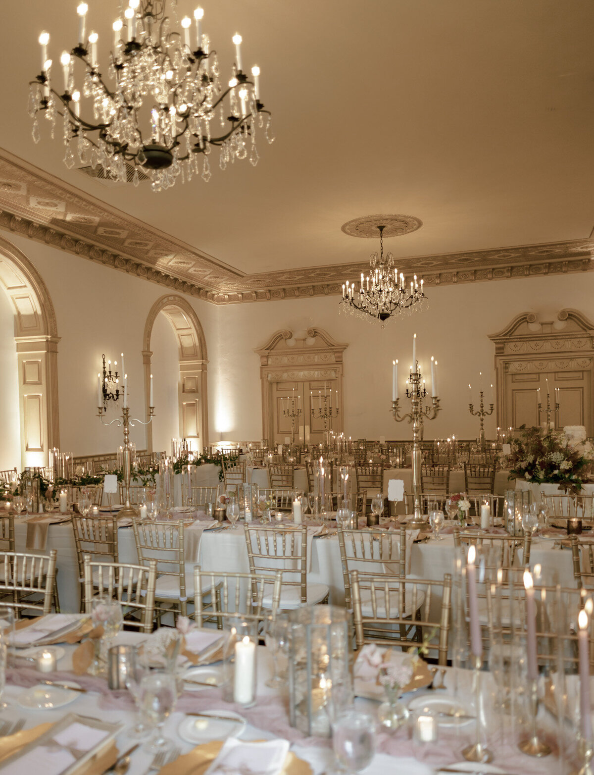 Candlelit, warm wedding reception at The Colony Club, a unique Detroit wedding venue