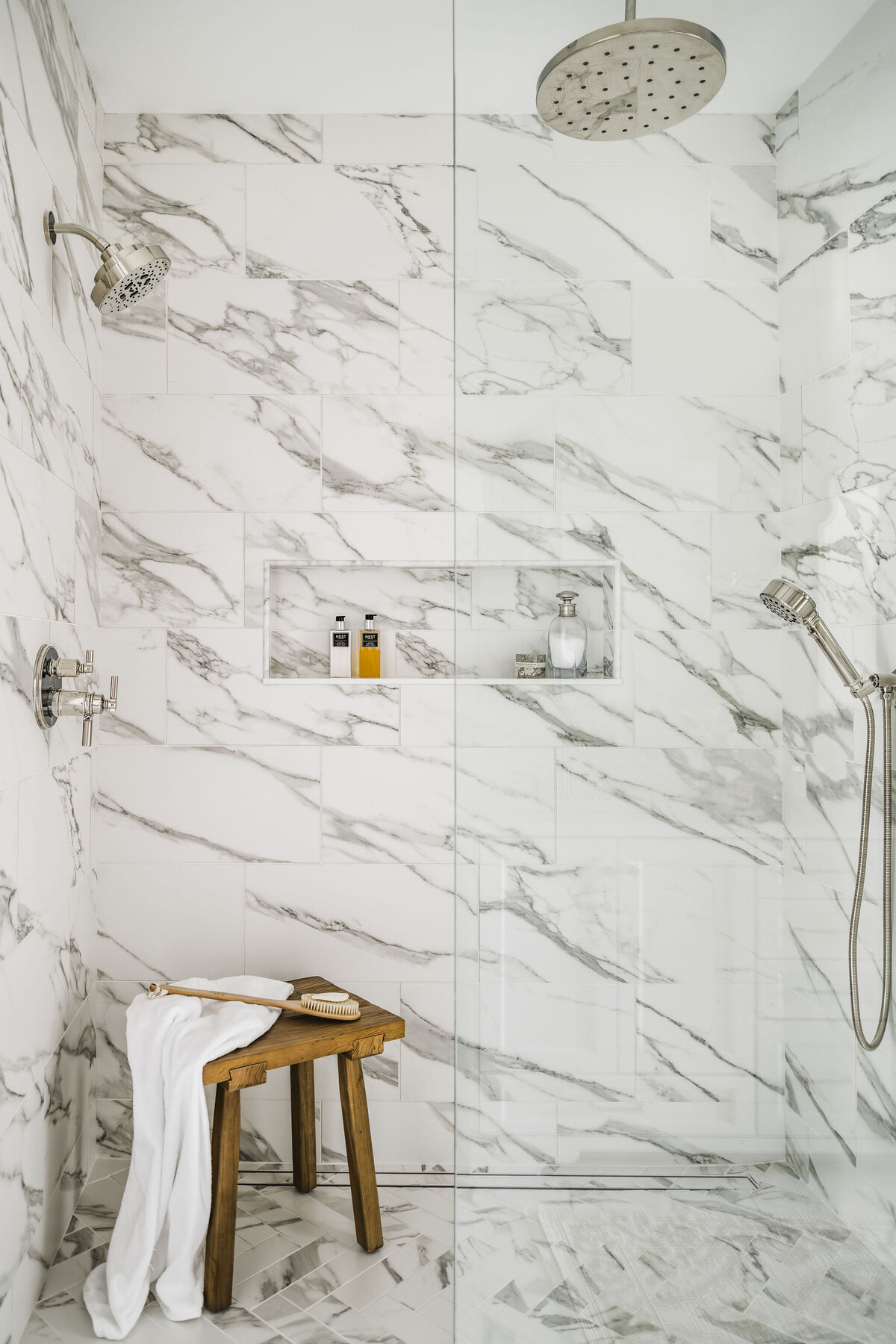 walk in shower design with white and gray tile