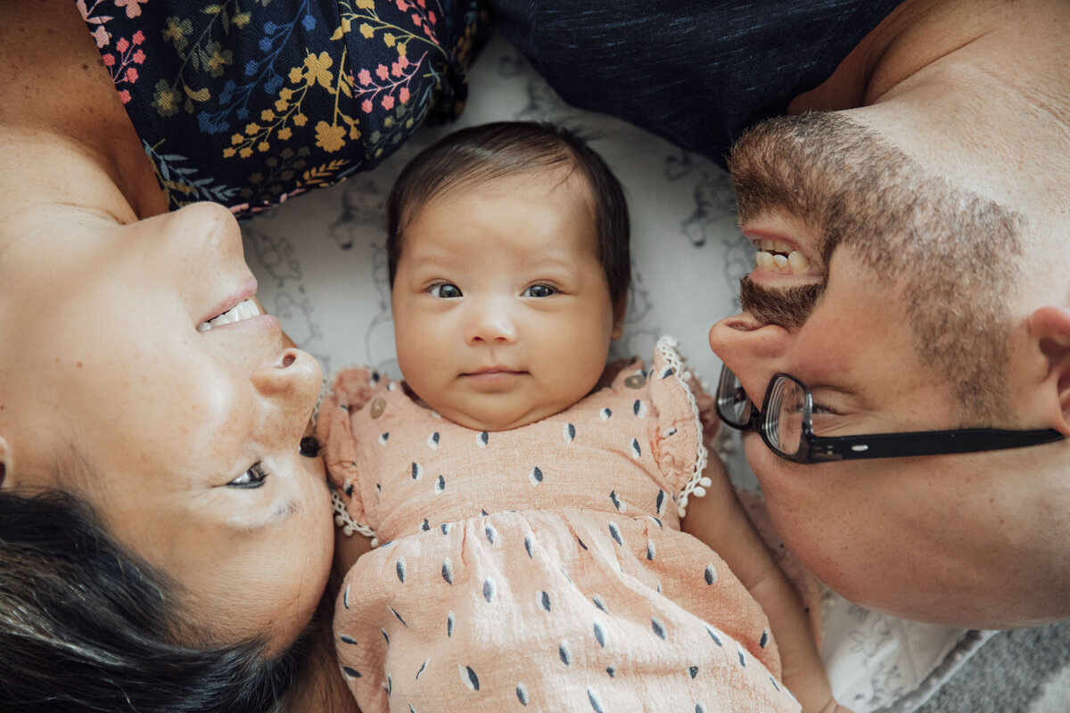 Newborn Photography | Baby wrapped in blanket during cozy lifestyle session | Morris County, New Jersey
