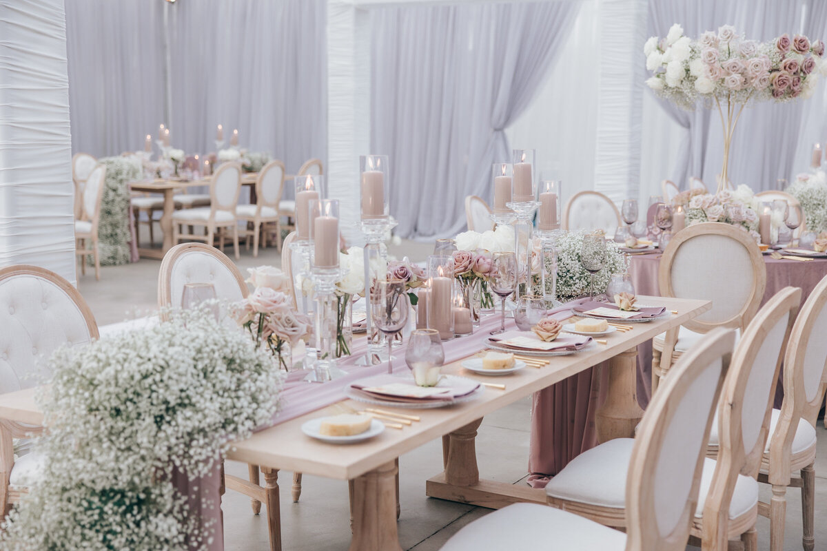 Glamorous head table for ivory and lavender themed wedding photographed by Nova Markina