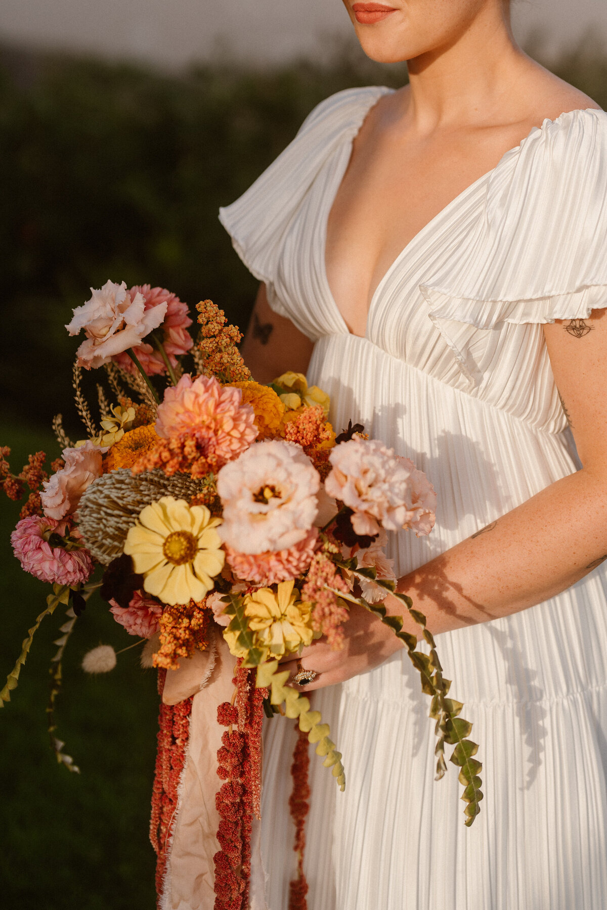 Yellow, blush and orange bridal bouquet