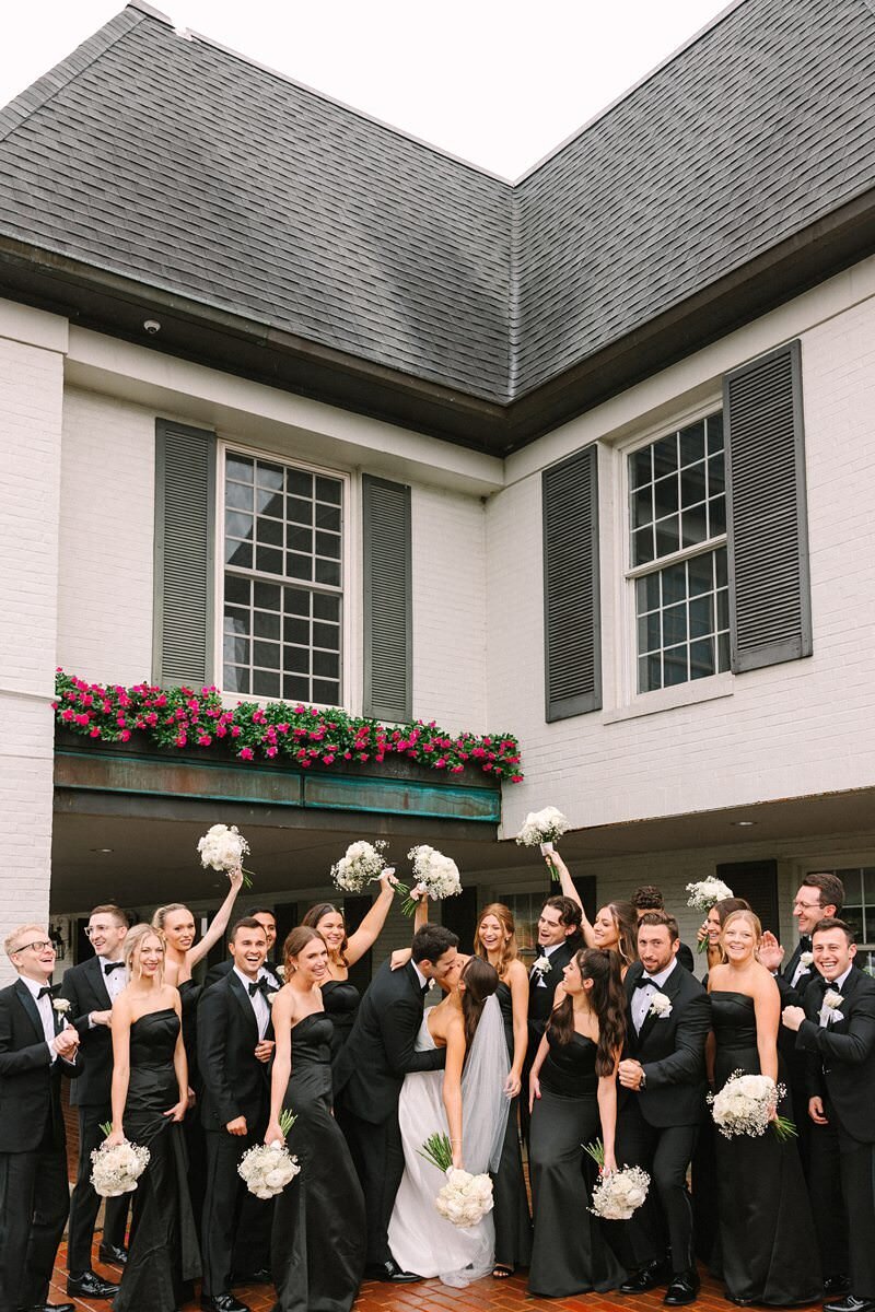 bride-and-groom-rainy-umbrella-evansville-country-club07