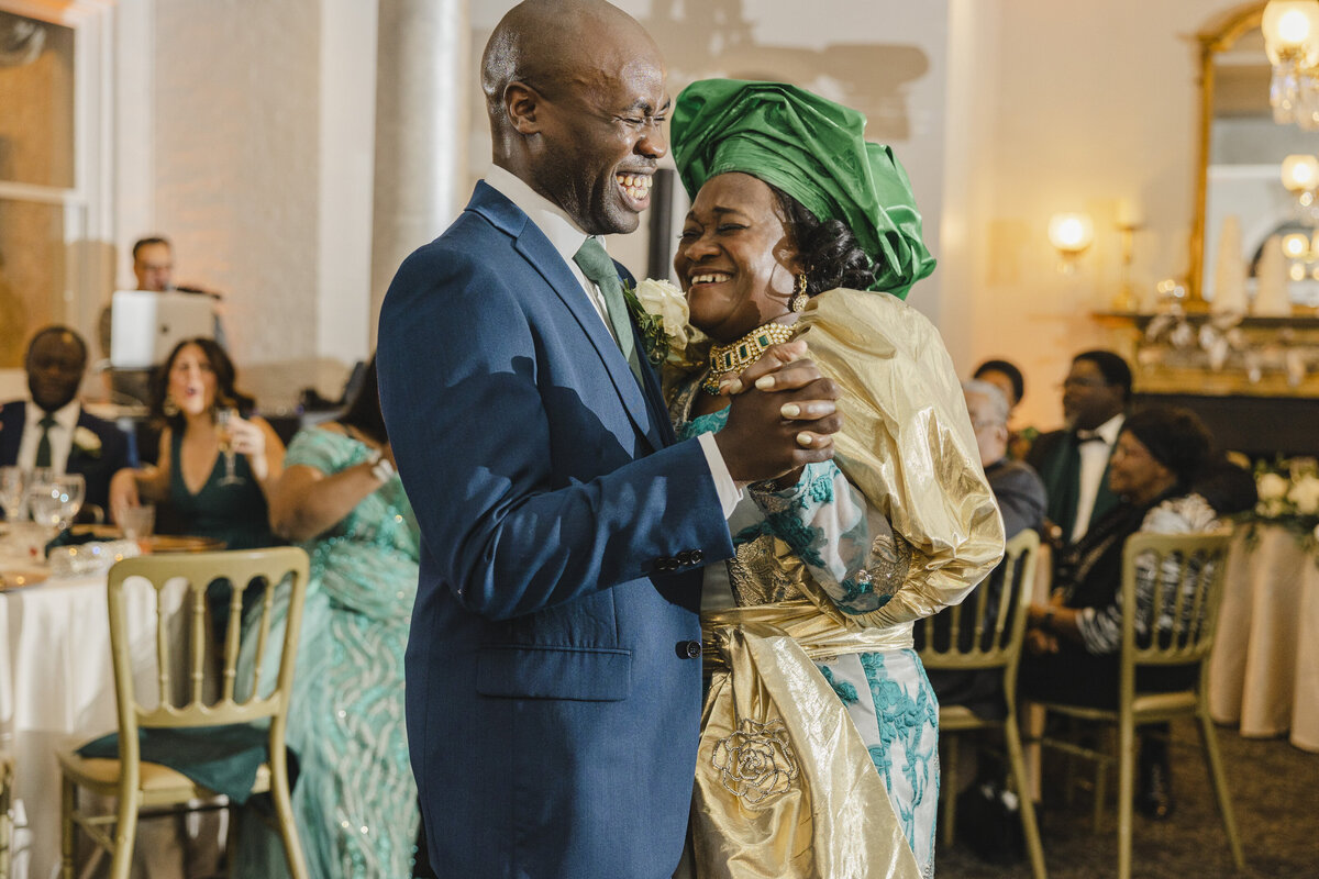 An older couple dancing at a wedding reception 