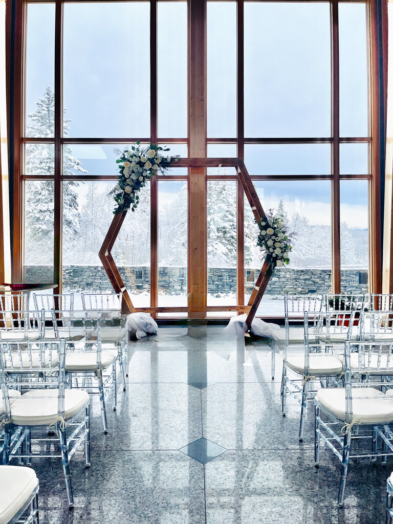 Romantic and feminine wedding ceremony floral decor by Le Bouquet, Calgary wedding florist, featured on the Brontë Bride Vendor Guide.