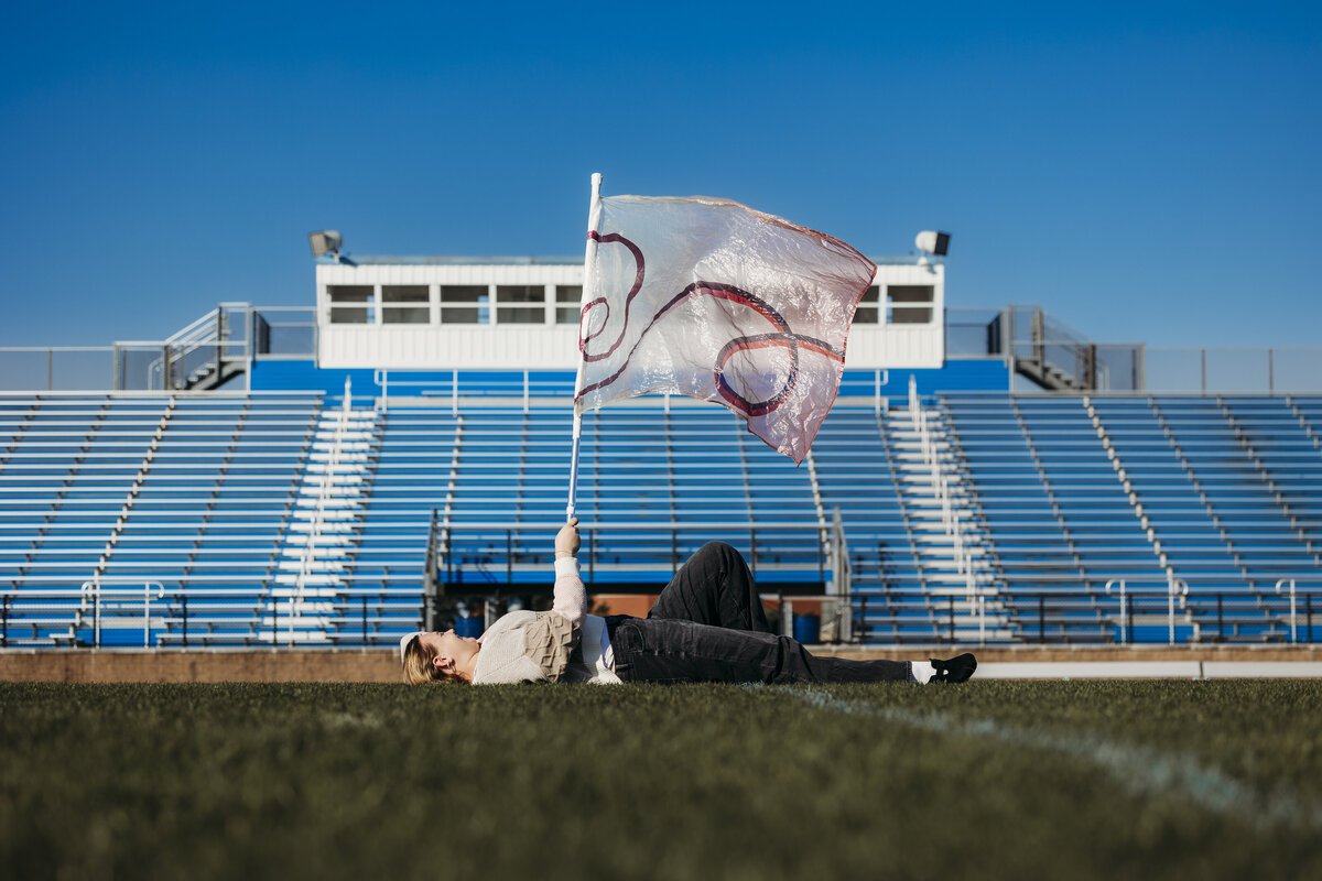 colorguard-holding-flag-laying-down
